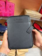 Coach bag ( Coach Tech Case in Signature Canvas )