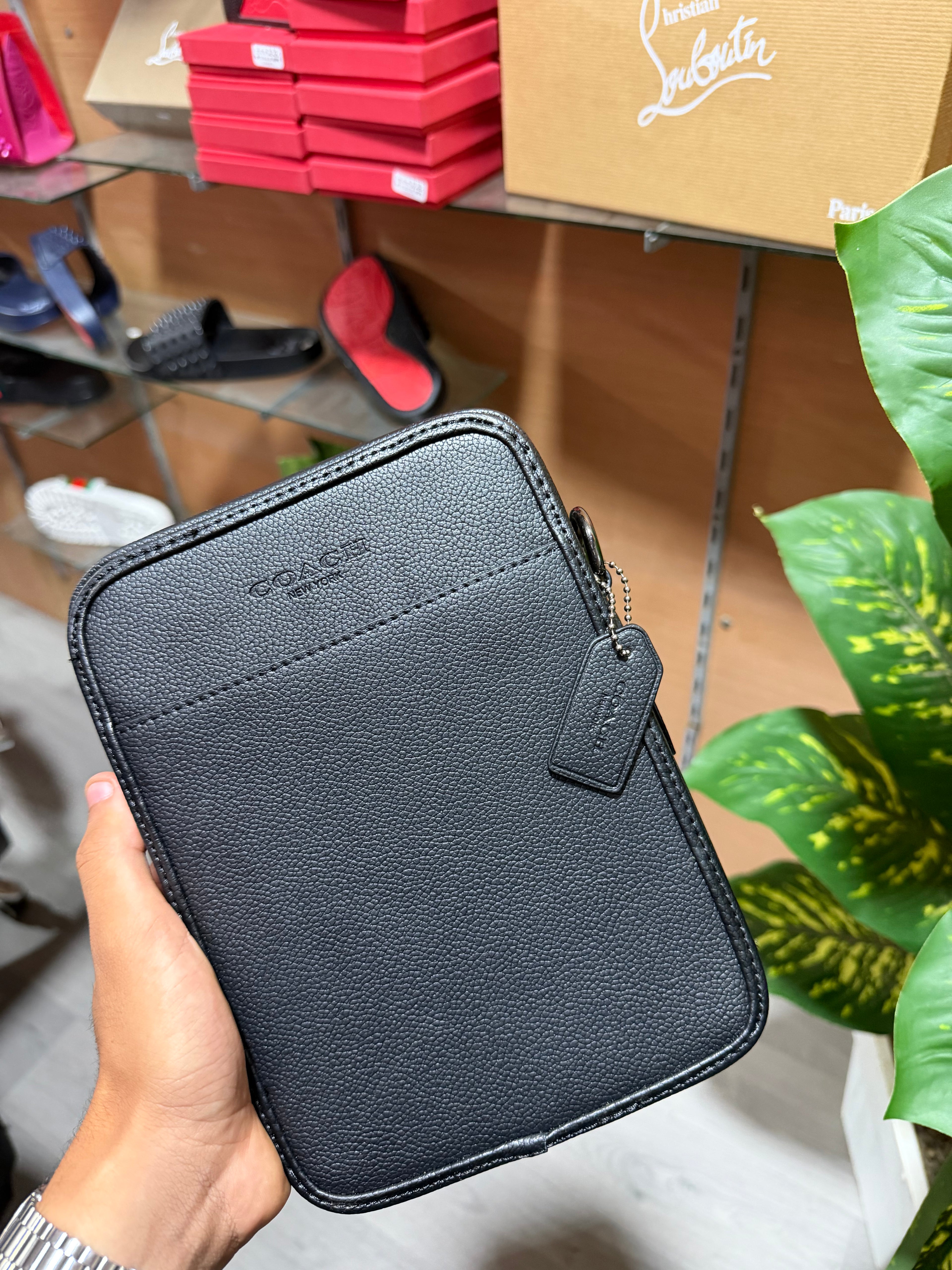 Coach bag ( Coach Tech Case in Signature Canvas )